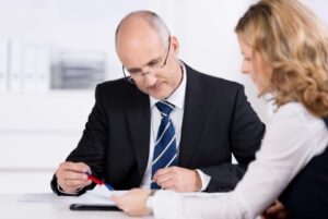 Solicitor reviewing a Will with a client