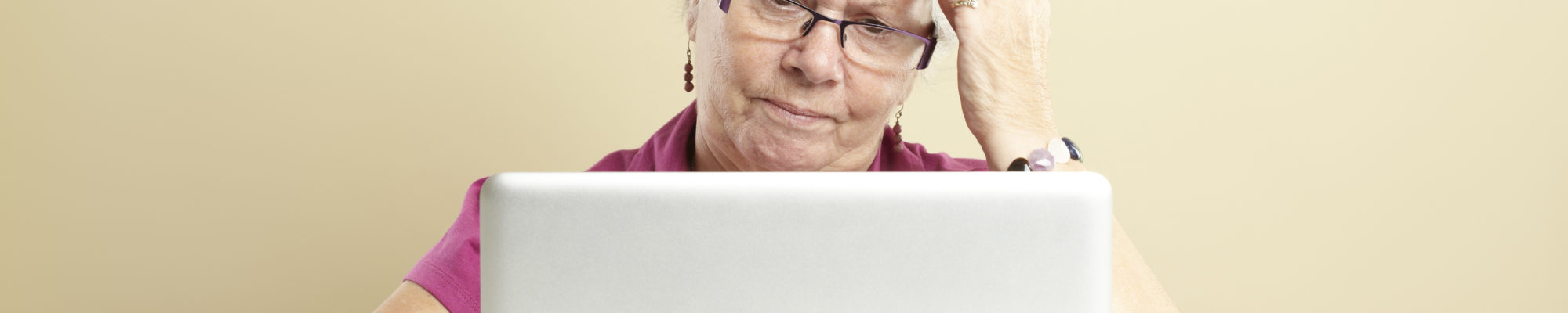 Senior using laptop